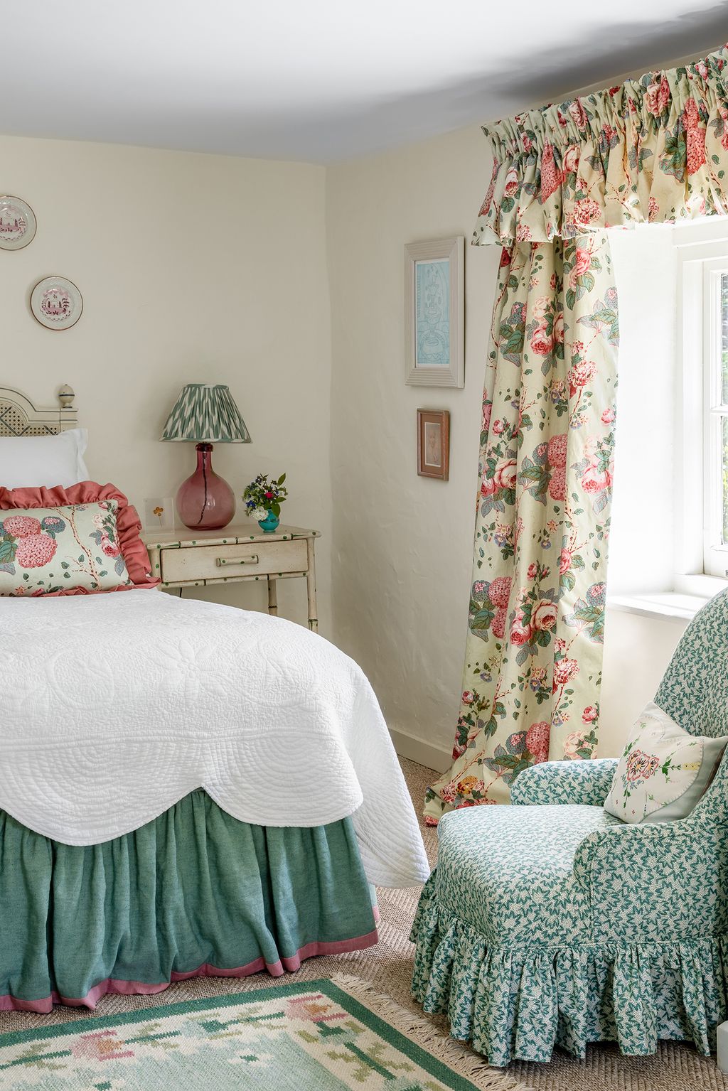 Image may contain Indoors Room Bedroom Furniture Living Room Dorm Room and Bed