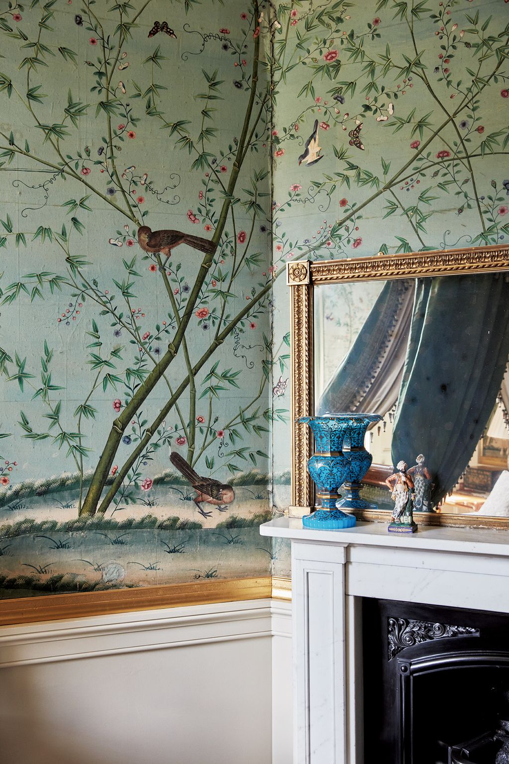 Image may contain Interior Design Indoors Animal Bird Art Wood Living Room Room and Floor