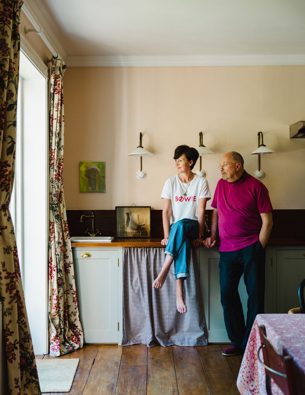 Image may contain Human Person Olivia Laing Home Decor Furniture Flooring Clothing Apparel Indoors and Living Room