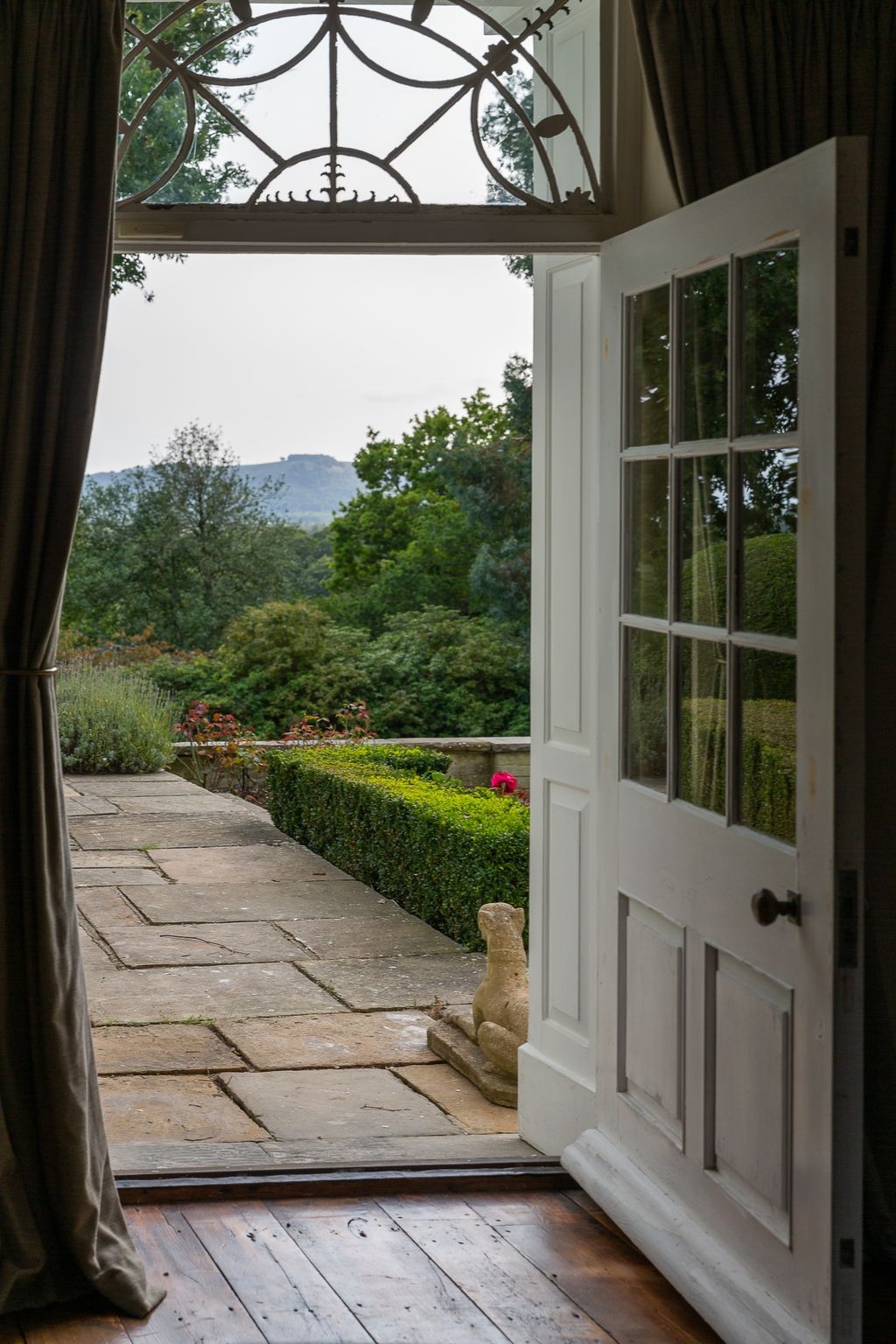Image may contain Flagstone Door and Window