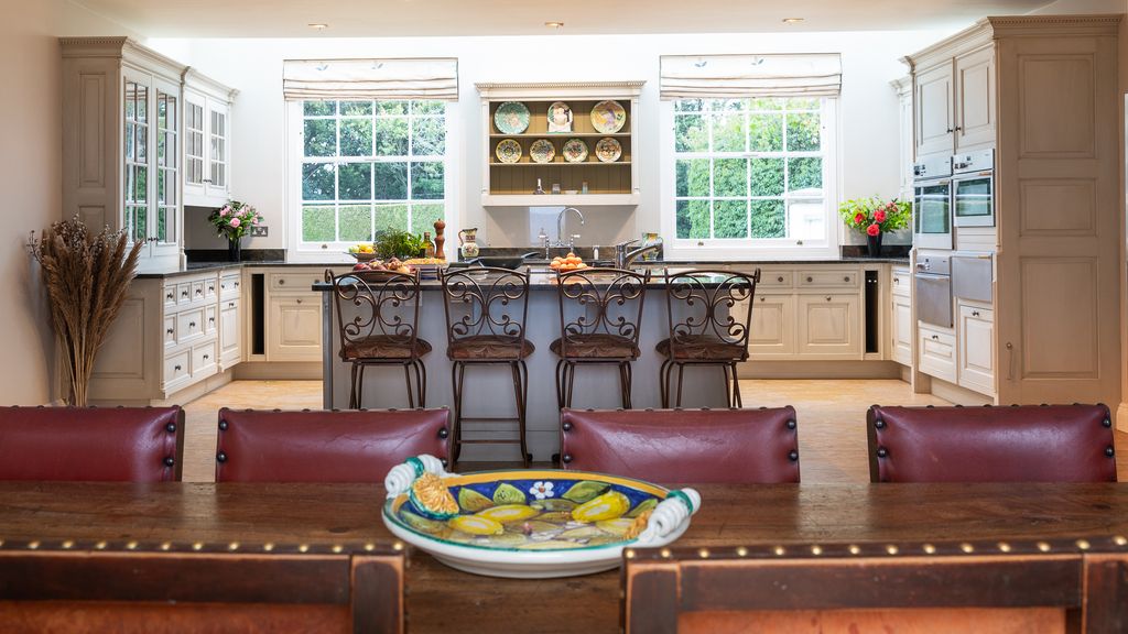 Image may contain Indoors Room Kitchen Island Kitchen and Furniture