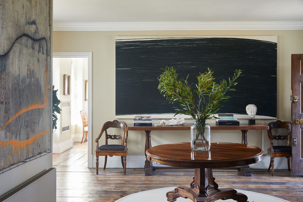 Image may contain Wood Furniture Chair Hardwood Flooring Living Room Room Indoors Table Tabletop and Plywood