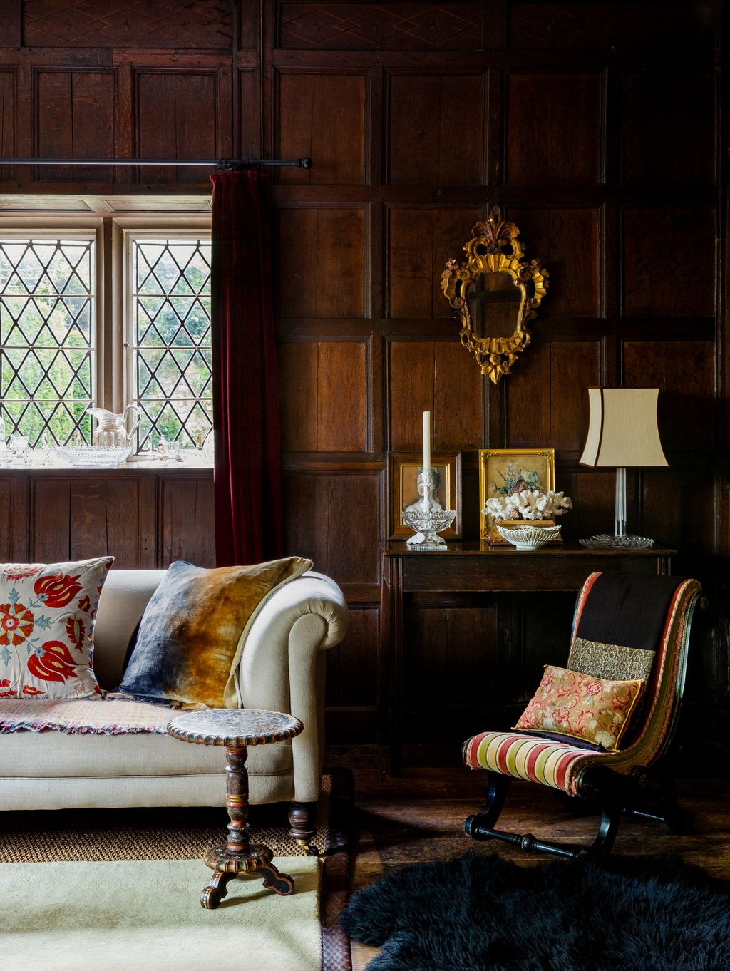 Image may contain Furniture Living Room Room Indoors Couch Chair and Home Decor