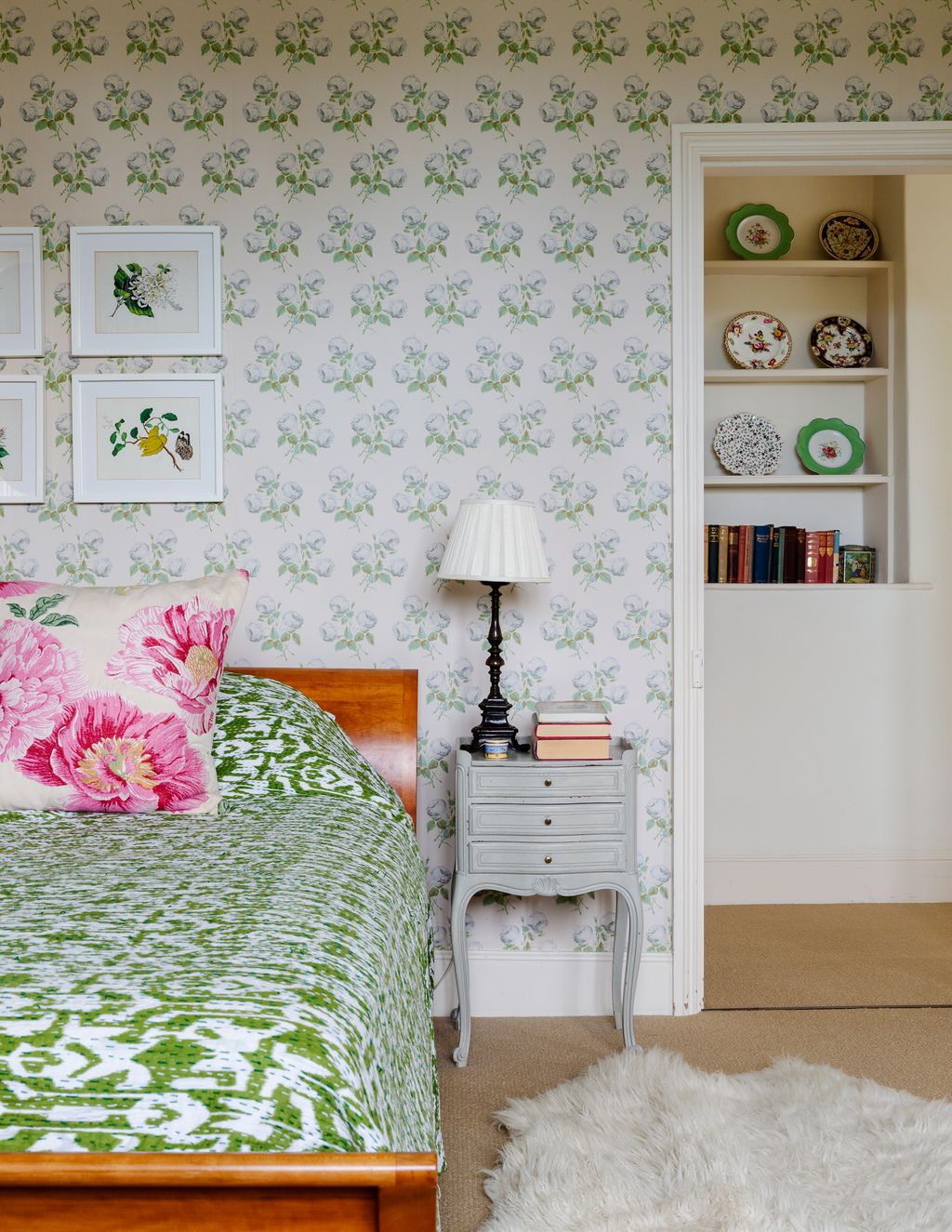 Image may contain Room Bedroom Indoors Interior Design Furniture Bed Cushion Lamp Table Lamp and Pillow