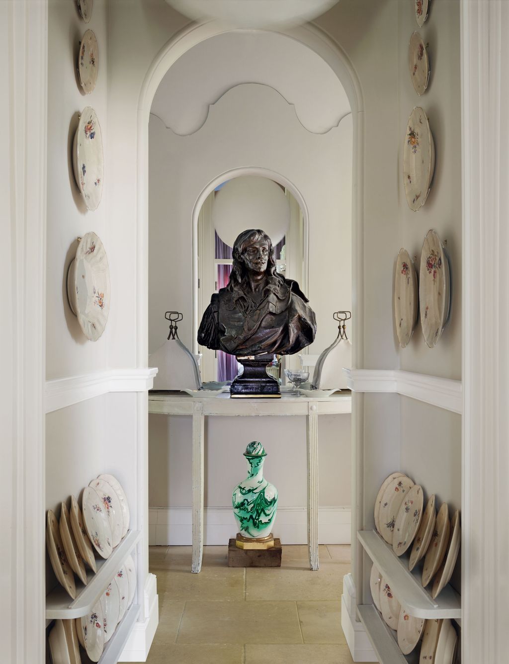 Image may contain Shelf Human Person Floor Interior Design Indoors and Flooring