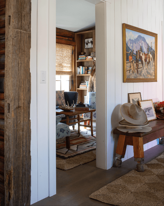 “It became clear to me that the new part of the cabin at the entrance needed to feel intimate and inviting so we added a...