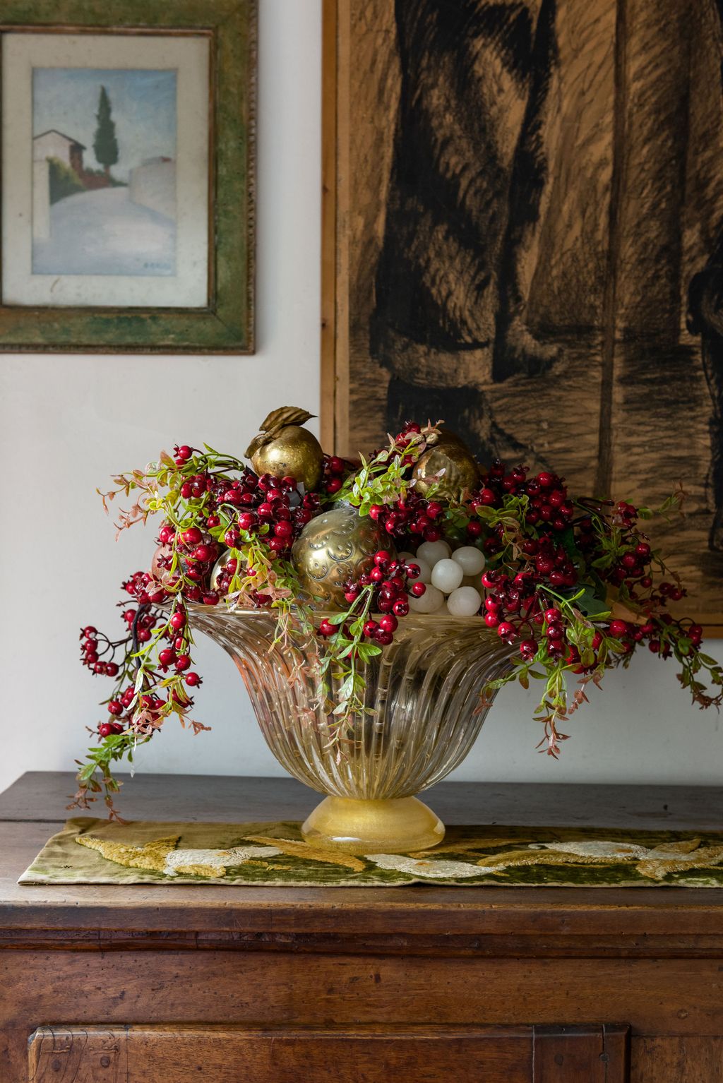 A 20thcentury Murano vase holds a Christmas display put together by Lucia.