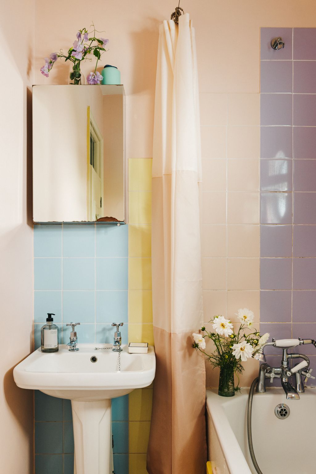 The bathroom tiles are original to the flat.