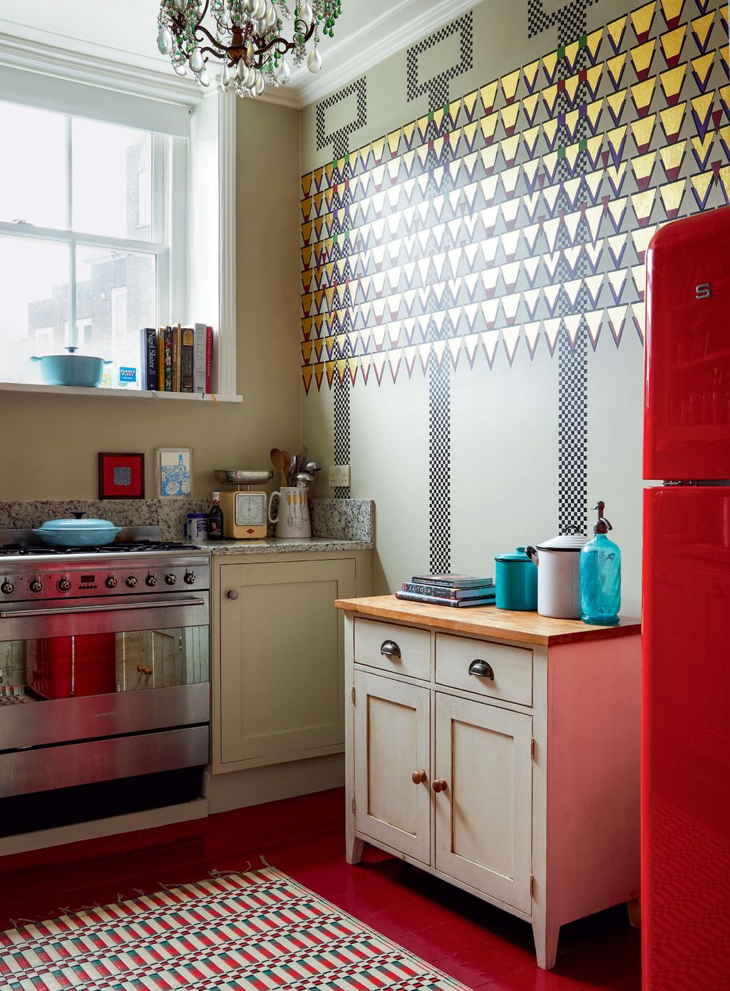 Image may contain Indoors Room Interior Design Kitchen Appliance Furniture and Rug