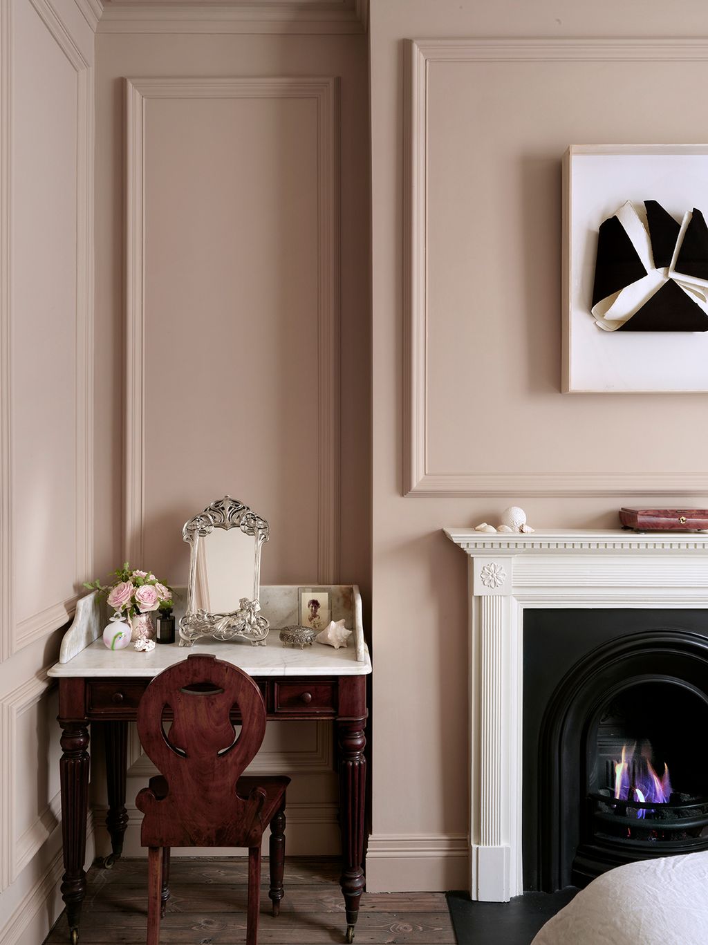 Image may contain Indoors Fireplace Hearth and Furniture