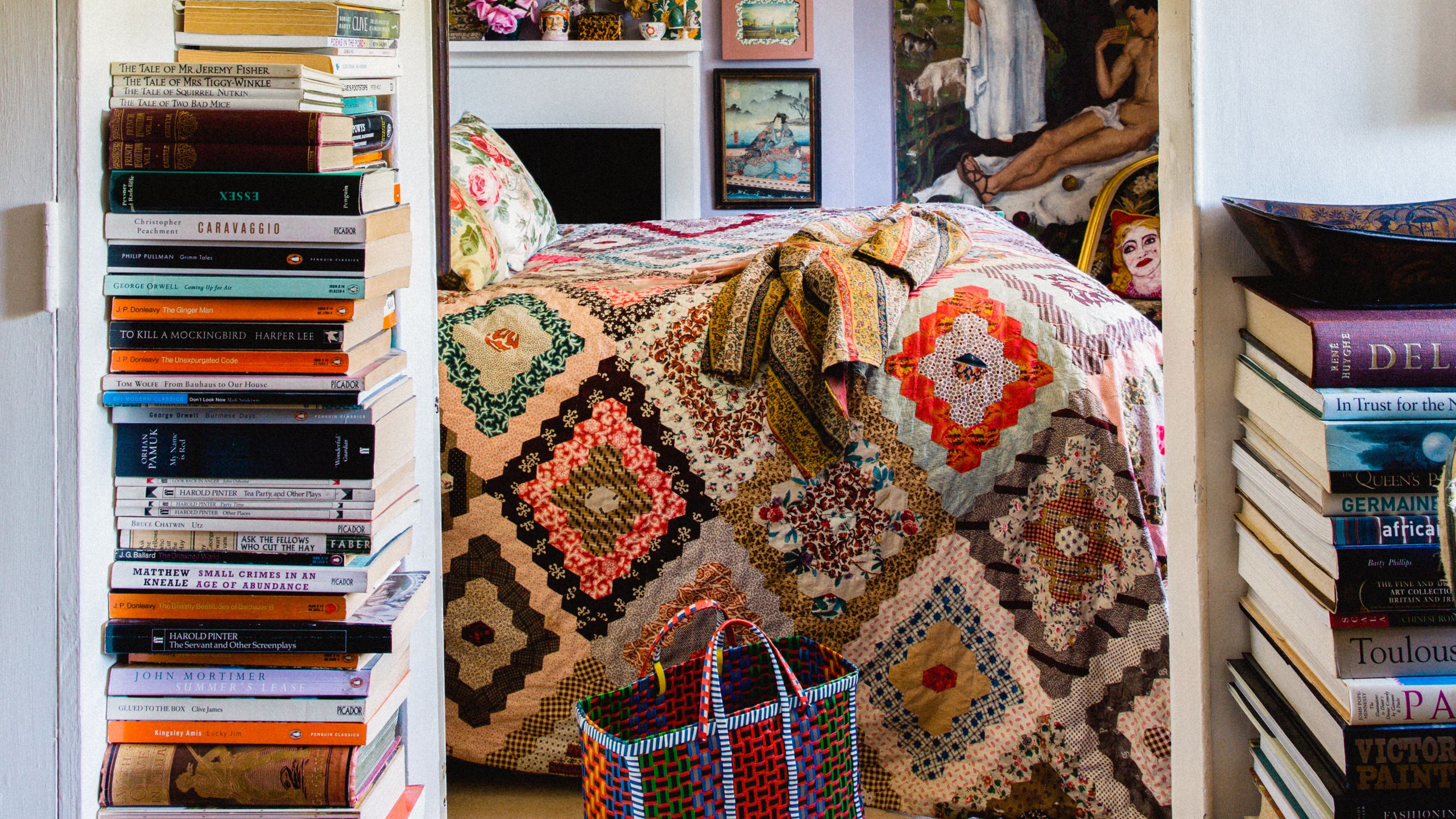 Image may contain Shelf Furniture Interior Design Indoors Room Bookcase Human Person and Living Room