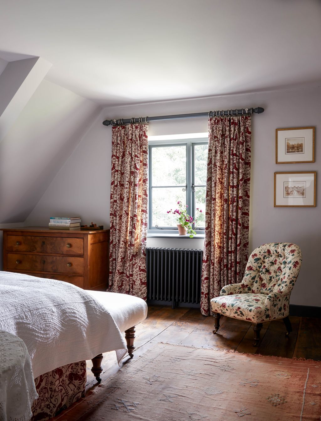 Image may contain Furniture Indoors Room Bedroom Chair Bed Living Room and Interior Design