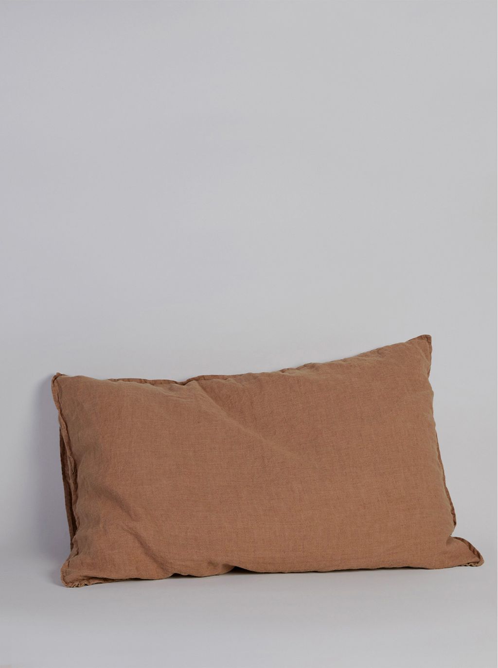 Linen Pillowcase rust starting at 97.99 for a pair with either a duvet cover or flat sheet from Larusi.  buttongroup ...