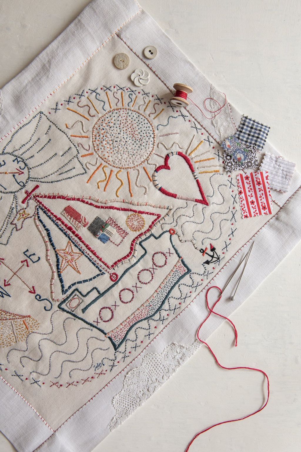 Image may contain Pattern Embroidery Rug Stitch and Applique