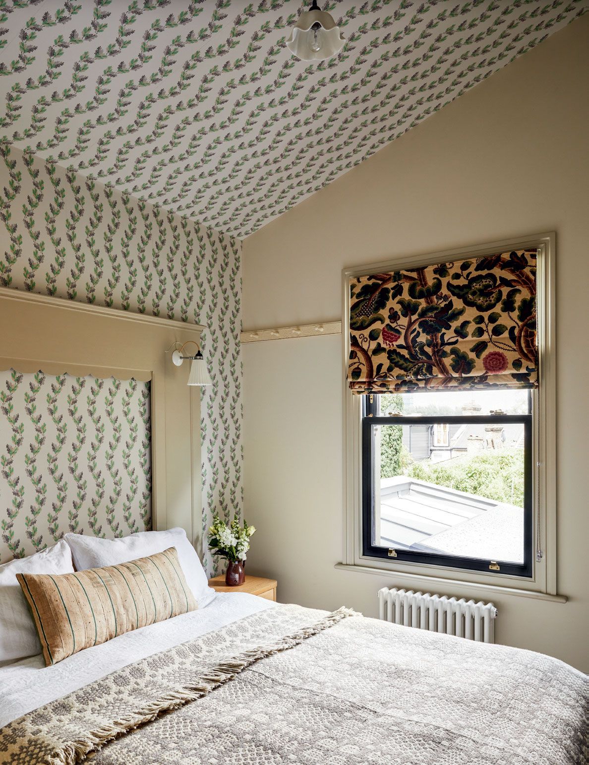 Image may contain Home Decor Room Bedroom Indoors Furniture Interior Design Cushion Rug Bed and Pillow