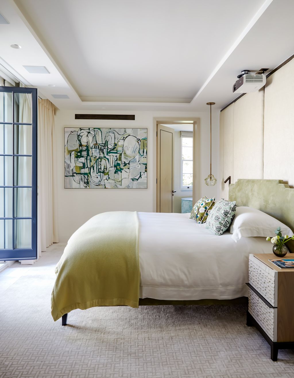 Image may contain Room Bedroom Indoors Furniture Living Room Interior Design and Dorm Room