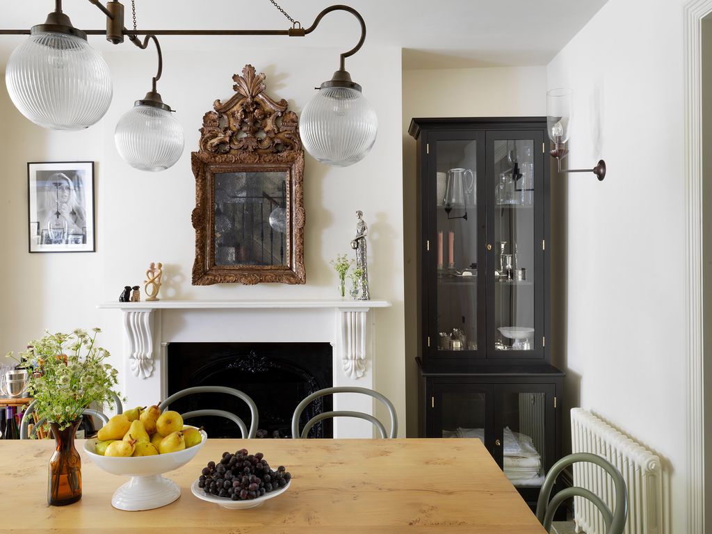 Image may contain Rose Repetto Furniture Indoors Room Plant Living Room Wood and Dining Room