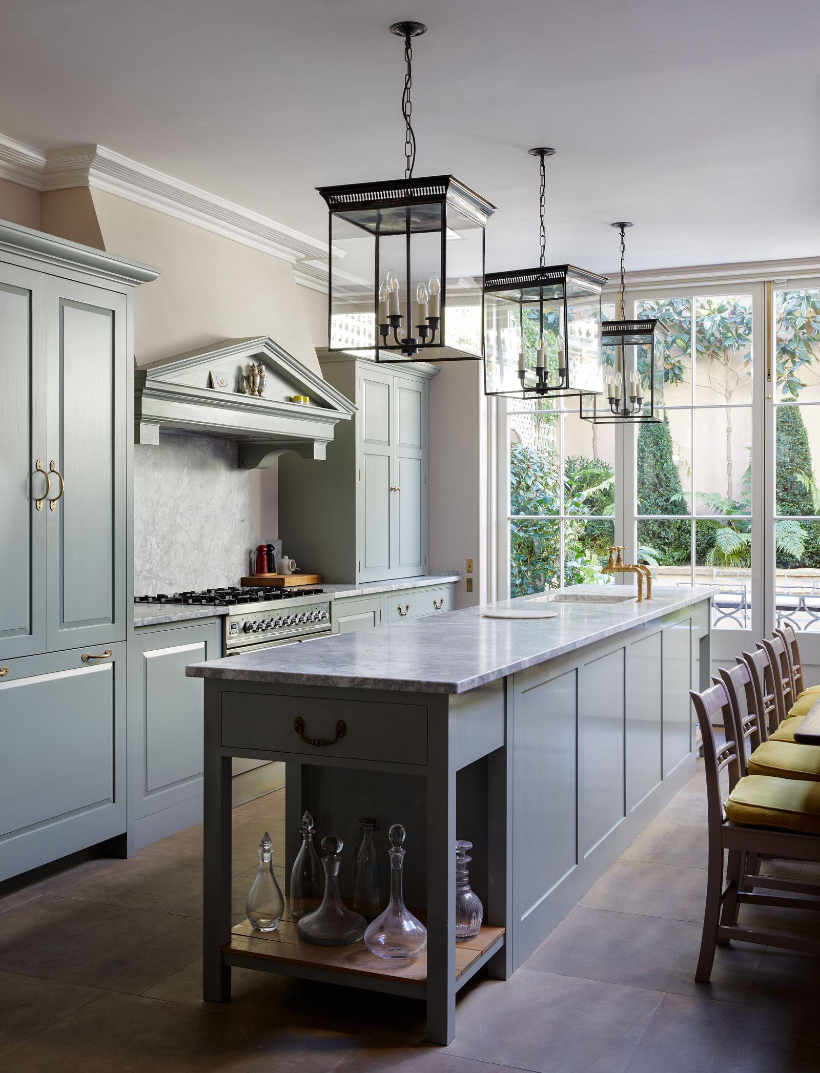 Image may contain Indoors Room Kitchen Island Kitchen Interior Design and Furniture