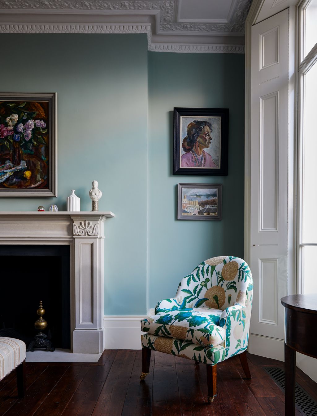 Image may contain Furniture Chair Interior Design Indoors Home Decor Living Room Room Fireplace Cushion and Pillow