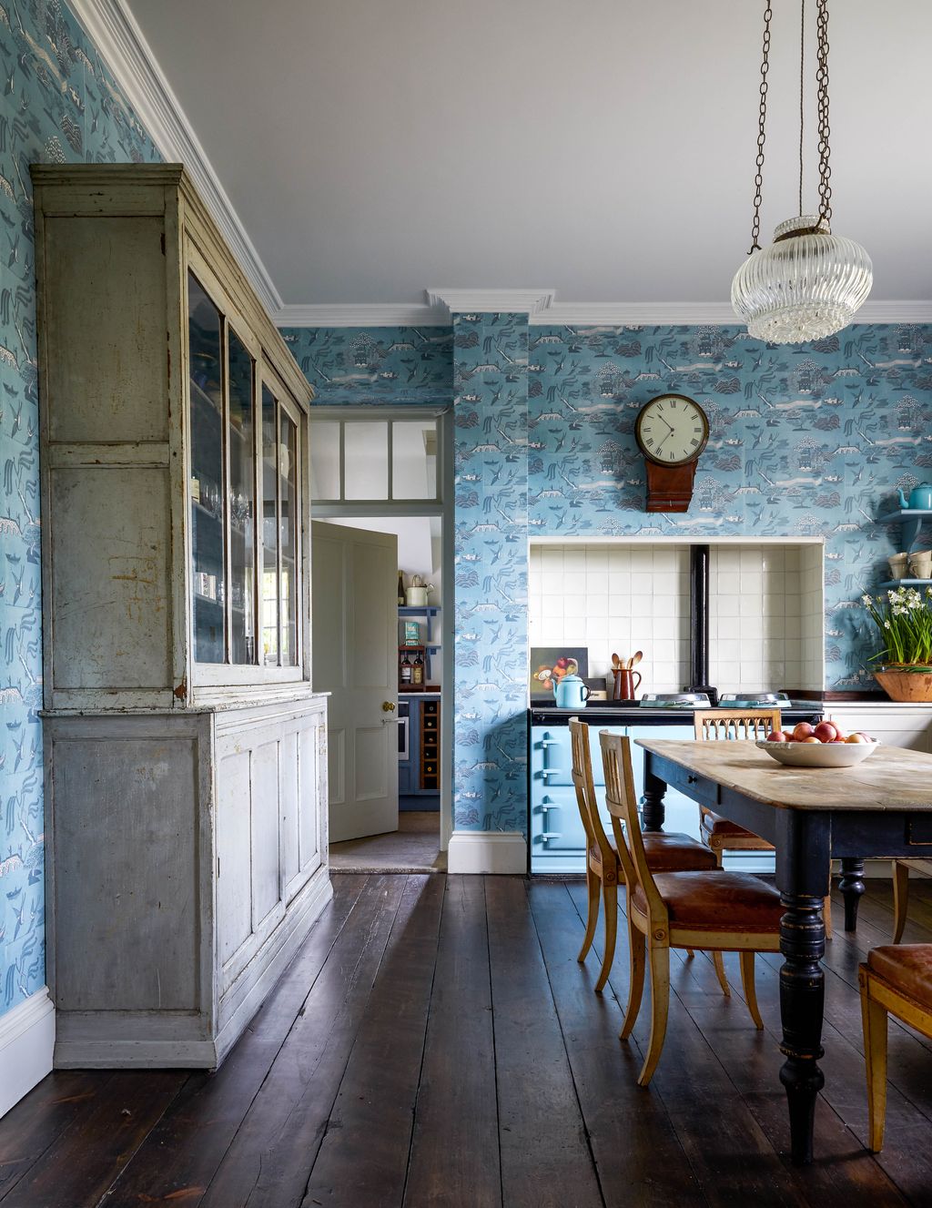 Image may contain Flooring Furniture Chair Wood Floor Hardwood Interior Design Indoors Room and Living Room