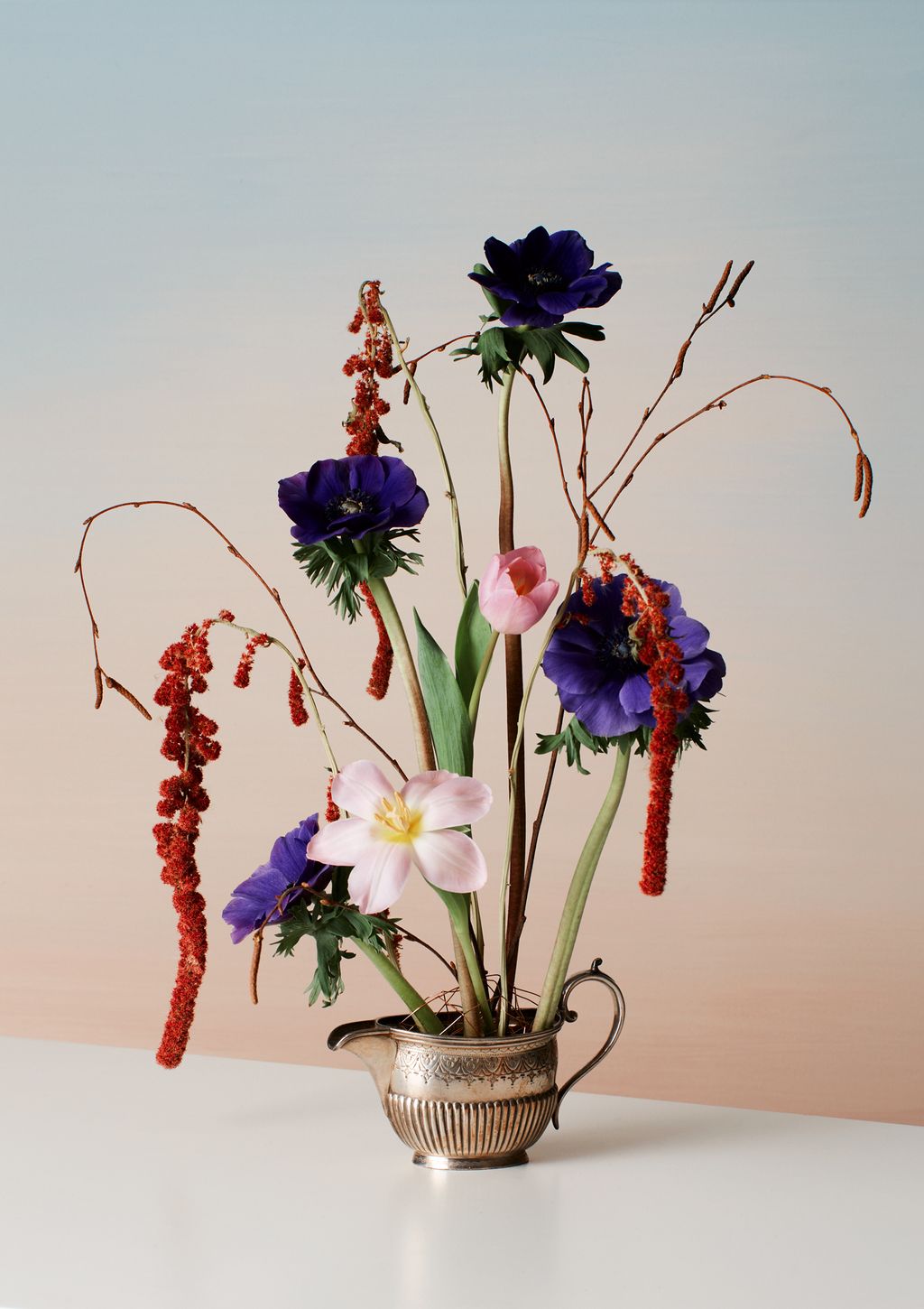 Image may contain Flower Ikebana Ornament Vase Flower Arrangement Plant Art Pottery Jar and Blossom