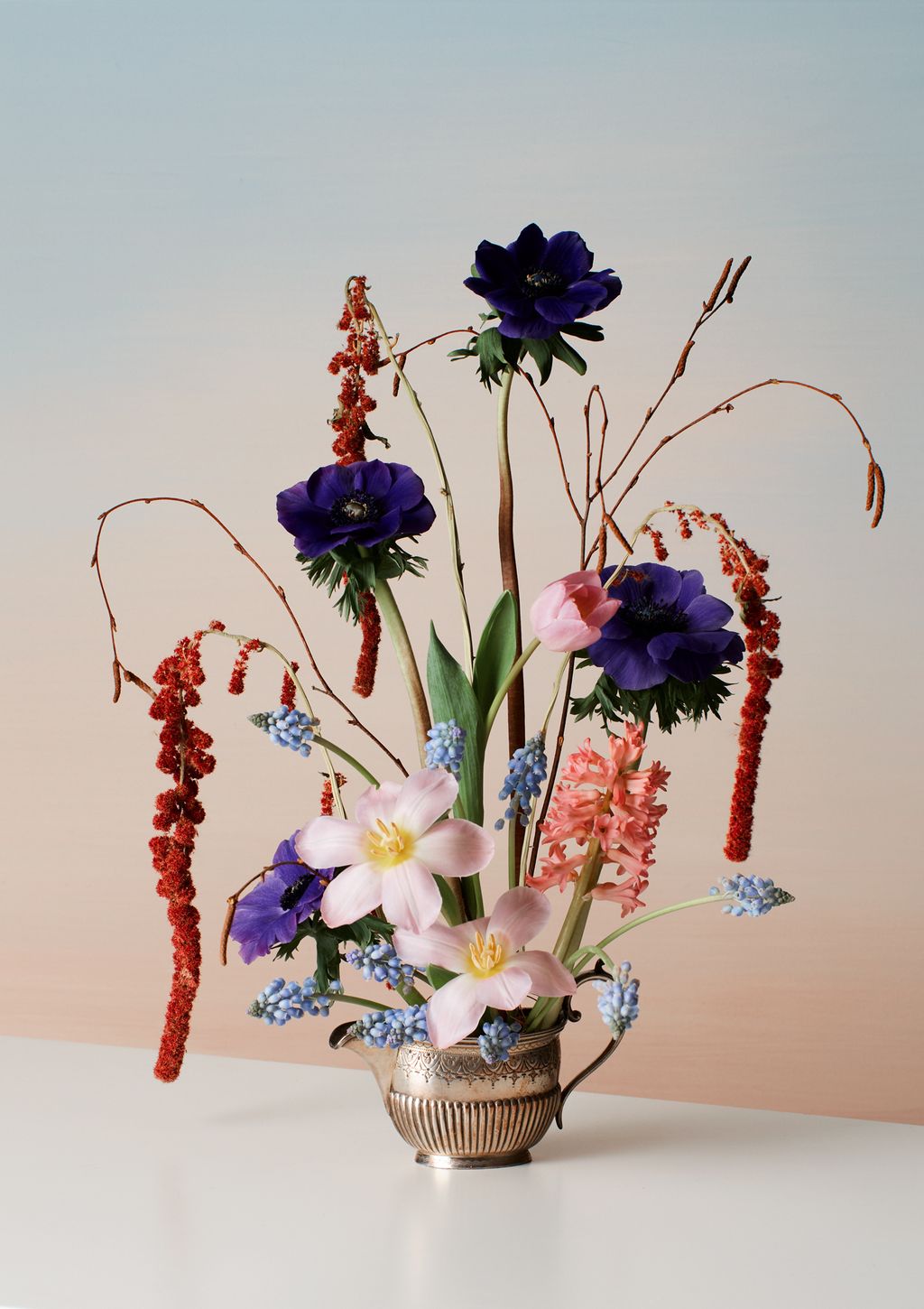 Image may contain Flower Ikebana Ornament Vase Flower Arrangement Plant Art Pottery Jar and Blossom