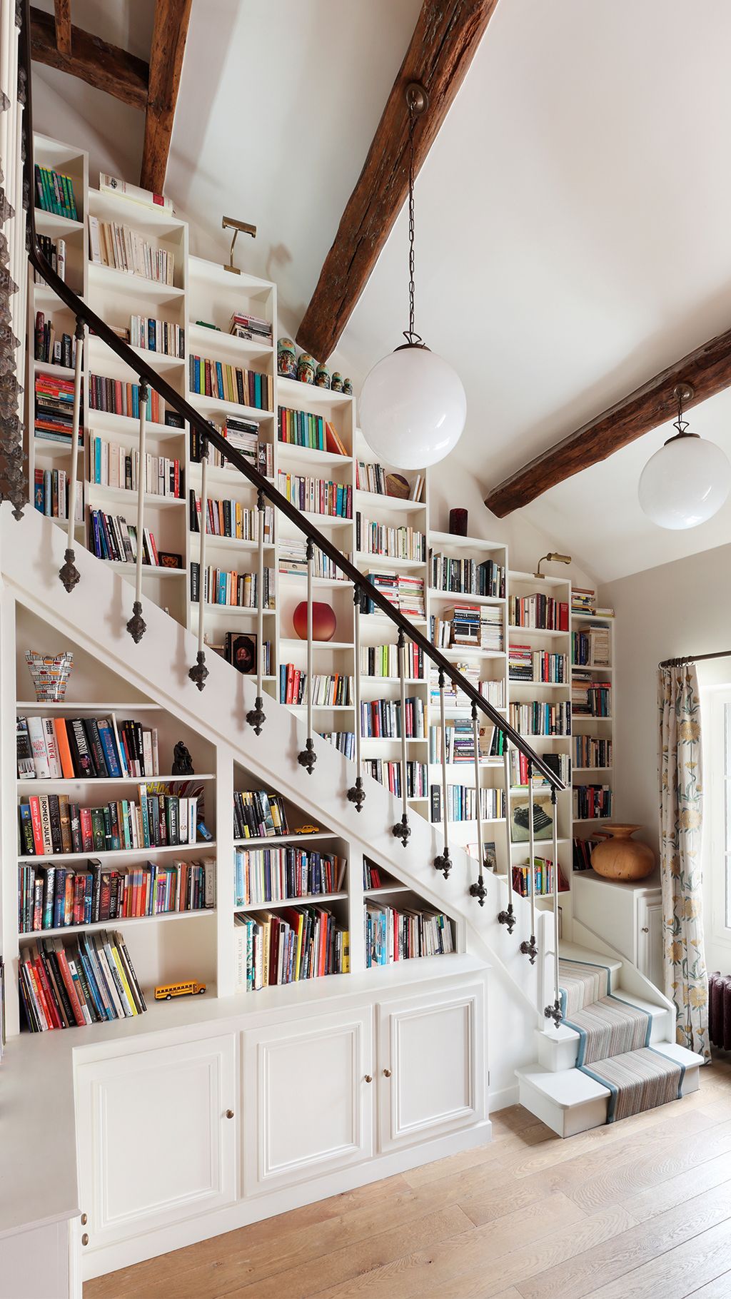 Image may contain Shelf Furniture Bookcase Indoors and Room