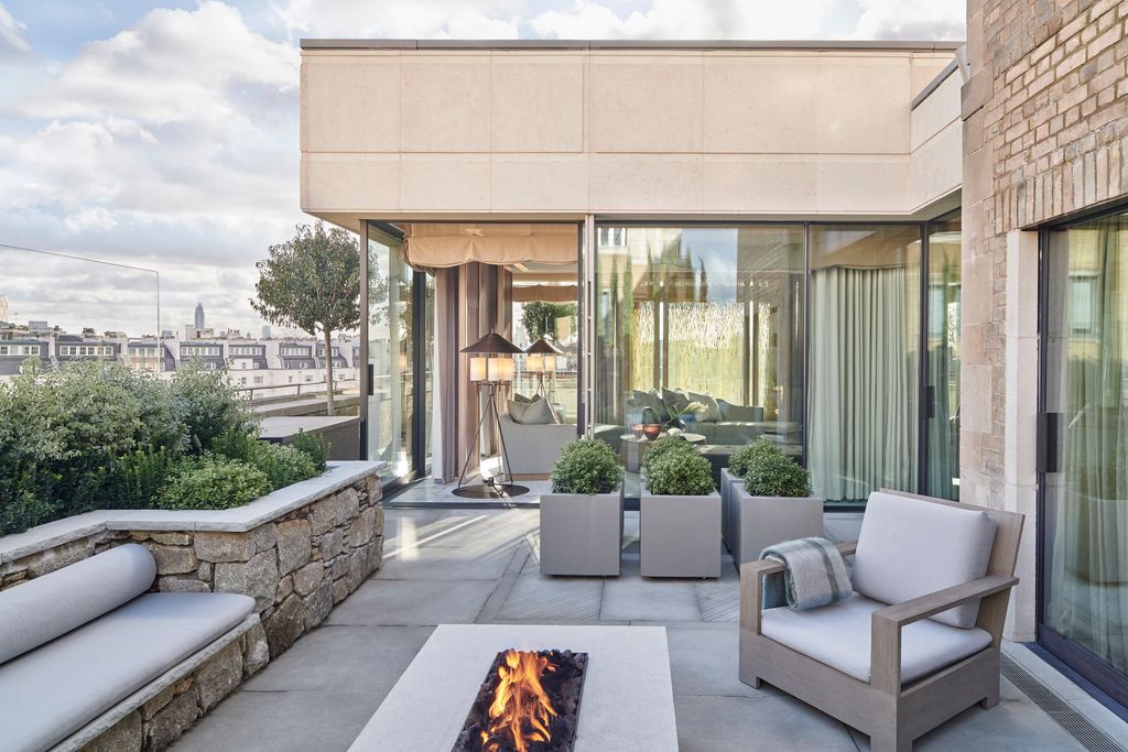 Image may contain Furniture Couch Living Room Indoors Room Patio and Table