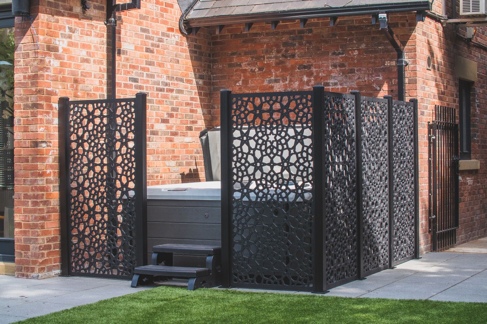 Image may contain Brick Plant Grass and Gate