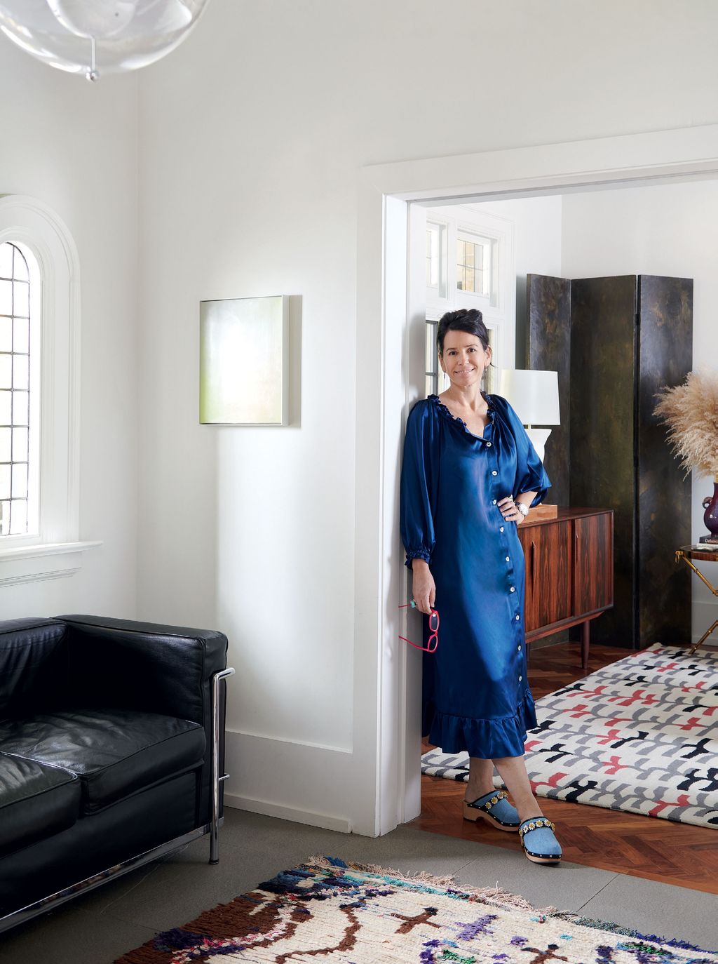 Image may contain Furniture Home Decor Clothing Apparel Human Person Room Indoors Evening Dress Fashion and Gown