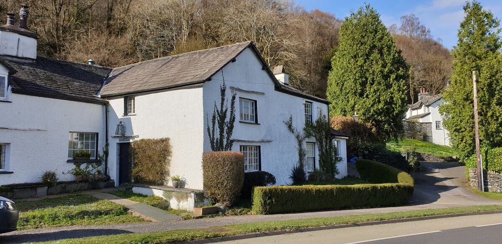 Image may contain Cottage Housing House Building Urban Vehicle Transportation Automobile Car and Suburb