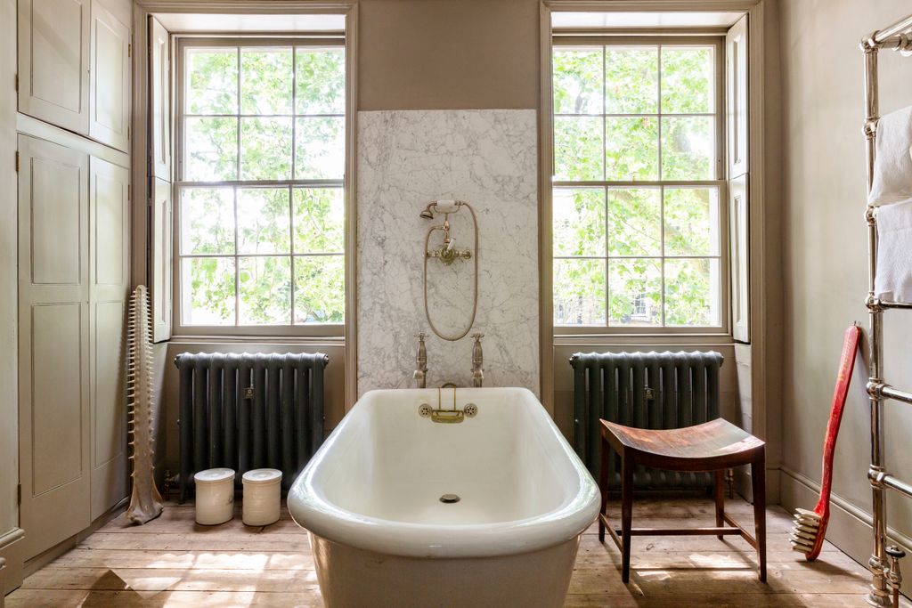 Image may contain Tub Bathtub Indoors Room and Interior Design