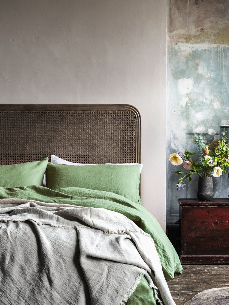 Image may contain: Indoors, Room, Bedroom, Interior Design, Furniture, Bed, and Plant