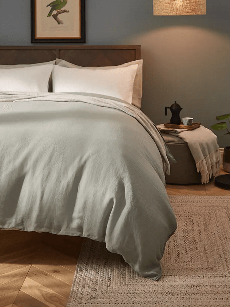 Image may contain: Furniture, Bed, Blanket, and Home Decor