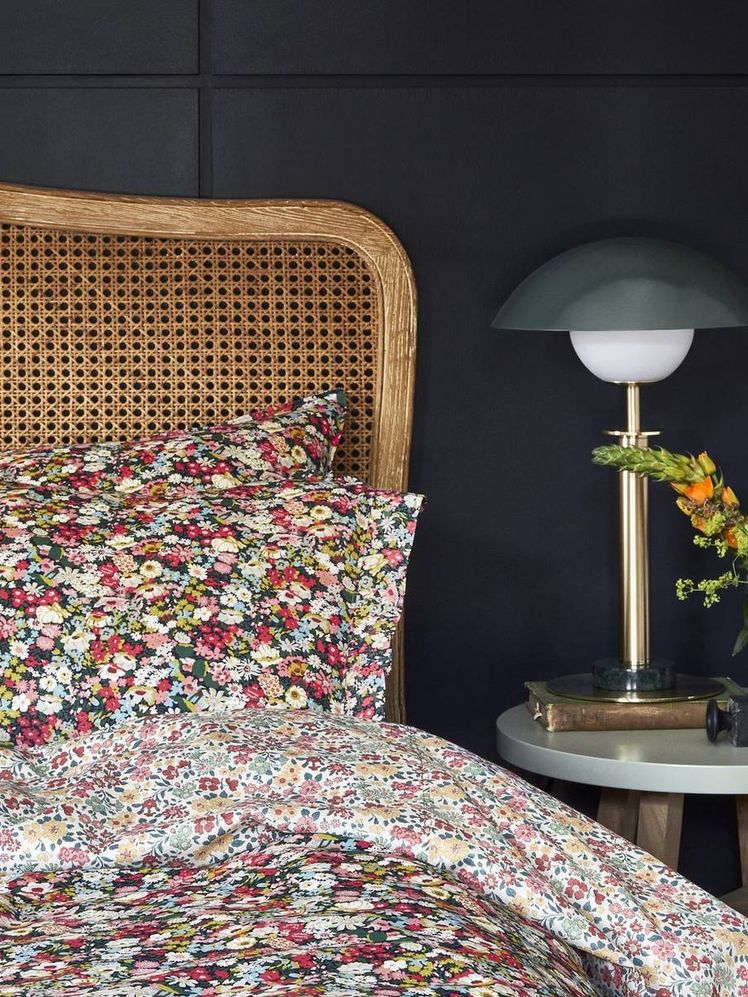 Image may contain: Lamp, Table Lamp, Furniture, Bed, Cushion, Indoors, Room, Bedroom, and Interior Design