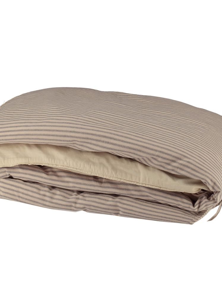 Image may contain: Blanket, Cushion, and Pillow