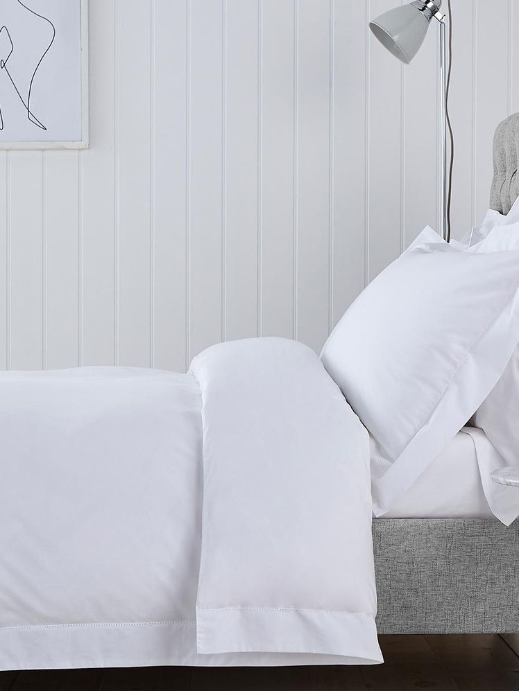 Image may contain: Furniture, Plant, Room, Bedroom, Indoors, Flower, Blossom, Bed, and Flower Arrangement