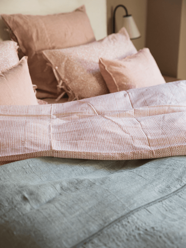 Image may contain: Cushion, Pillow, Home Decor, Linen, Furniture, and Bed