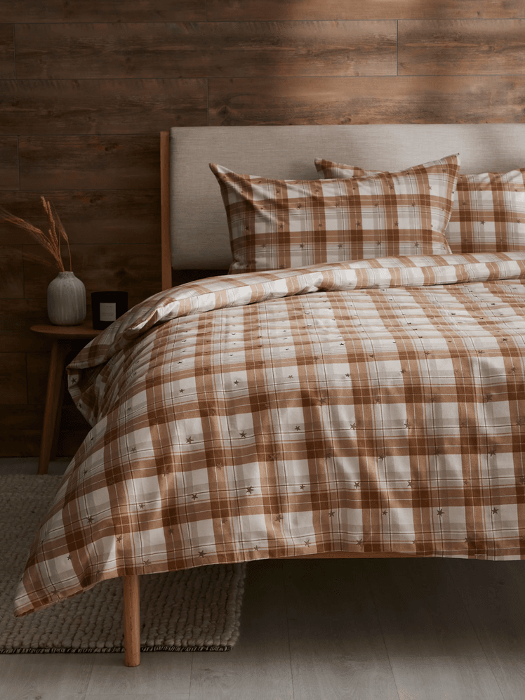 Image may contain: Furniture, Bed, Cushion, Home Decor, Pillow, Blanket, Linen, Indoors, Room, and Bedroom