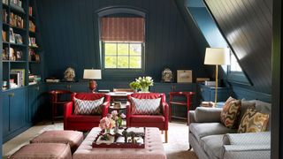 Image may contain Furniture Living Room Room Indoors Chair Housing and Building