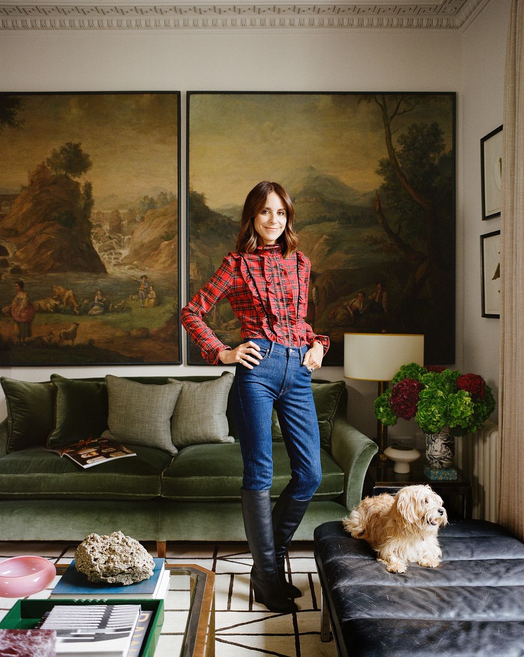 Image may contain Furniture Couch Human Person Living Room Room Indoors Home Decor Clothing and Apparel