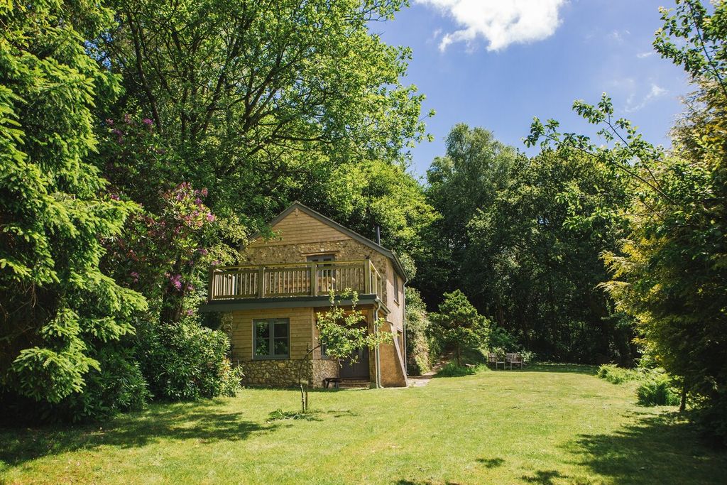 Image may contain Grass Plant Cottage Housing House Building Outdoors Nature Shelter Countryside Rural and Tree