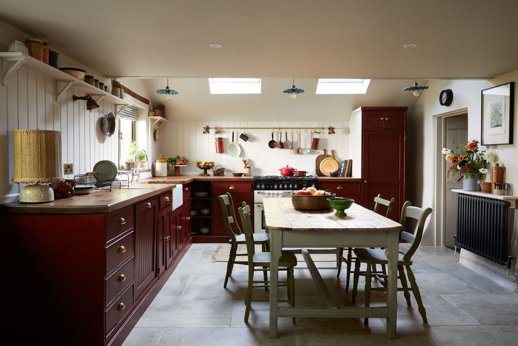 Image may contain Furniture Chair Indoors Room Kitchen Flooring Kitchen Island and Interior Design