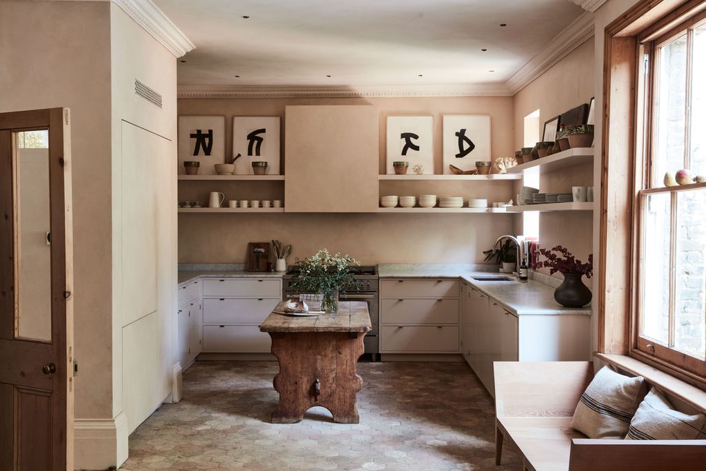 Image may contain Flooring Floor Wood Indoors Room Hardwood Interior Design Furniture and Kitchen