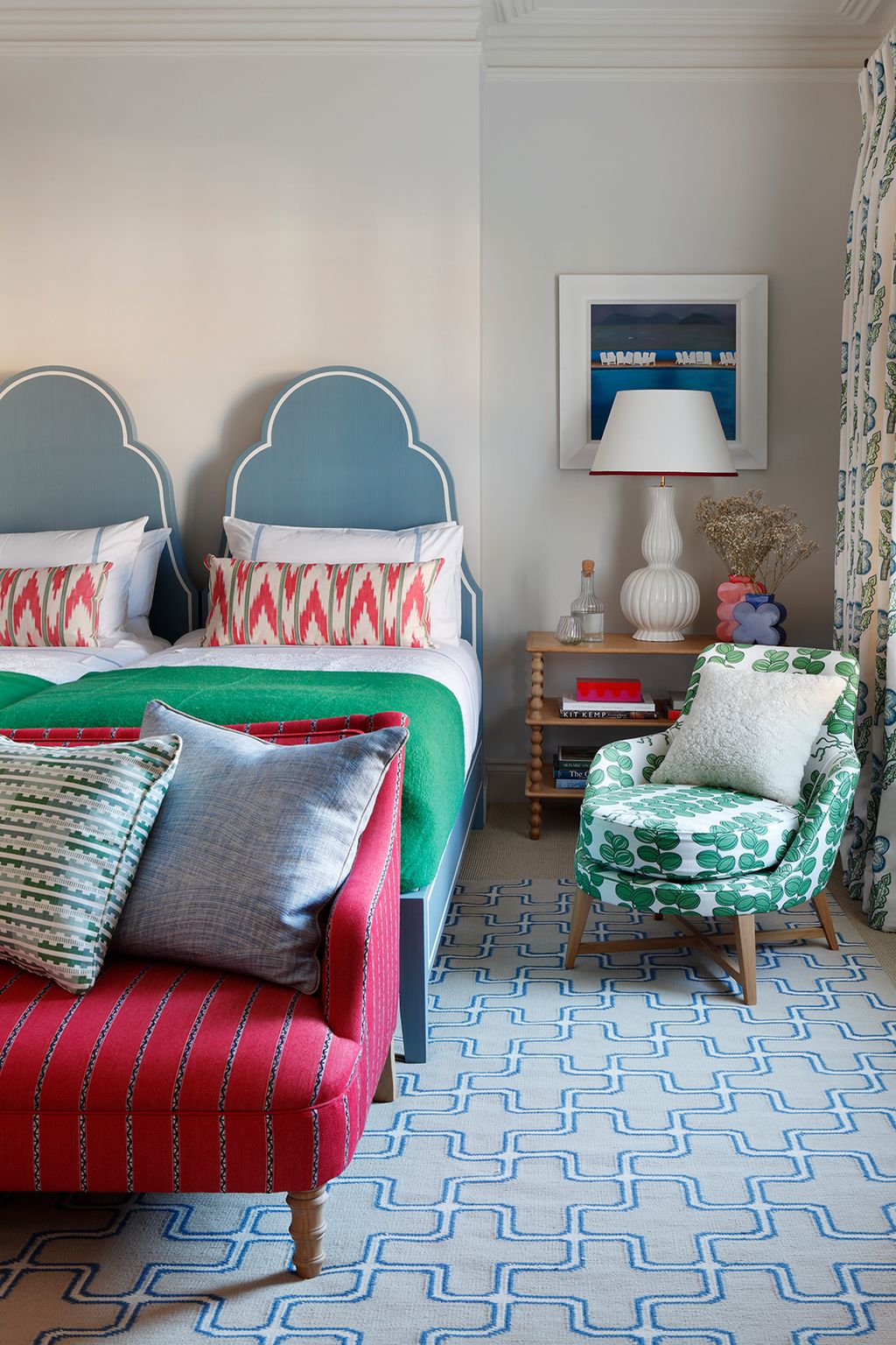 Image may contain Cushion Room Indoors Furniture Living Room Bedroom Pillow Couch Interior Design and Rug