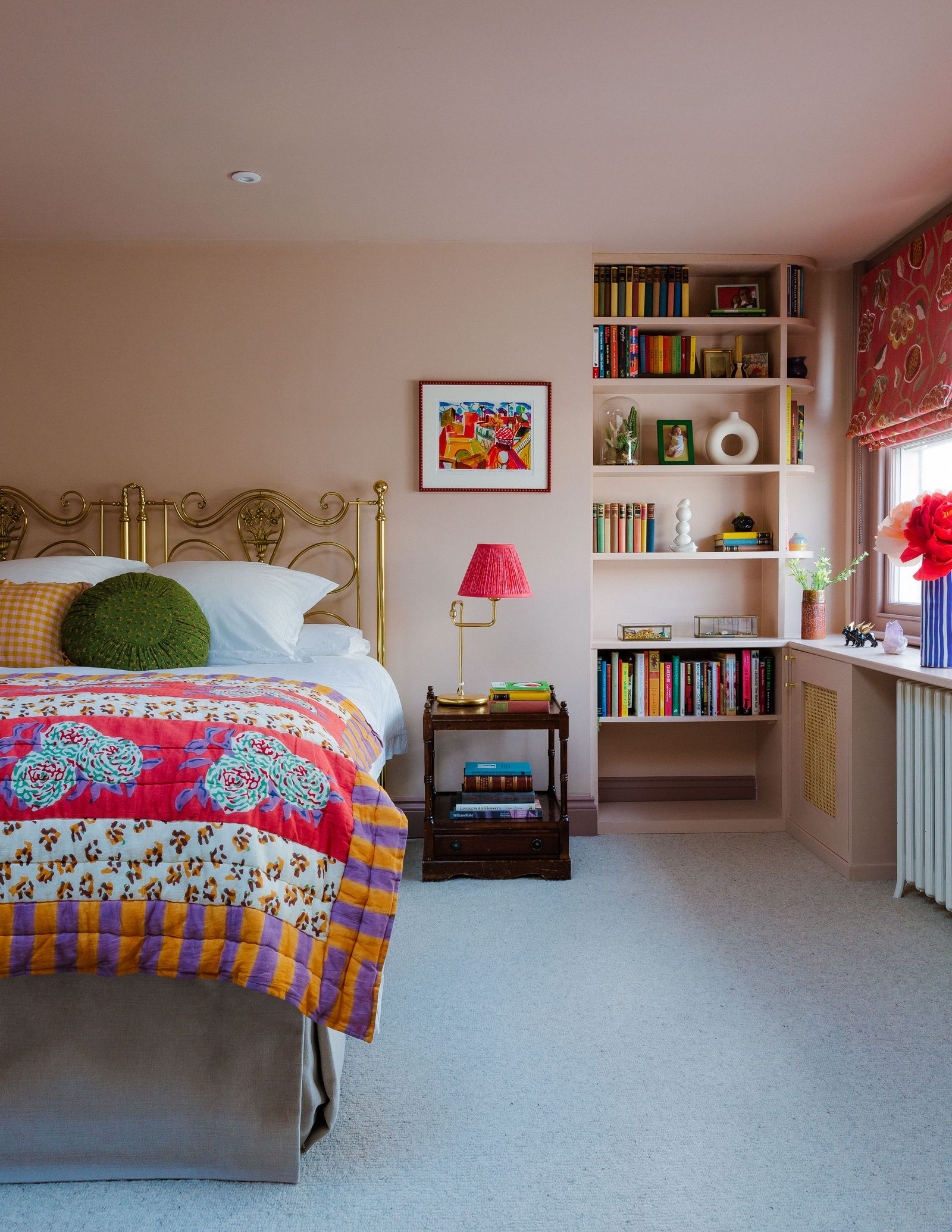 Image may contain Indoors Room Bedroom Furniture Interior Design Shelf Bed Flooring Living Room and Dorm Room