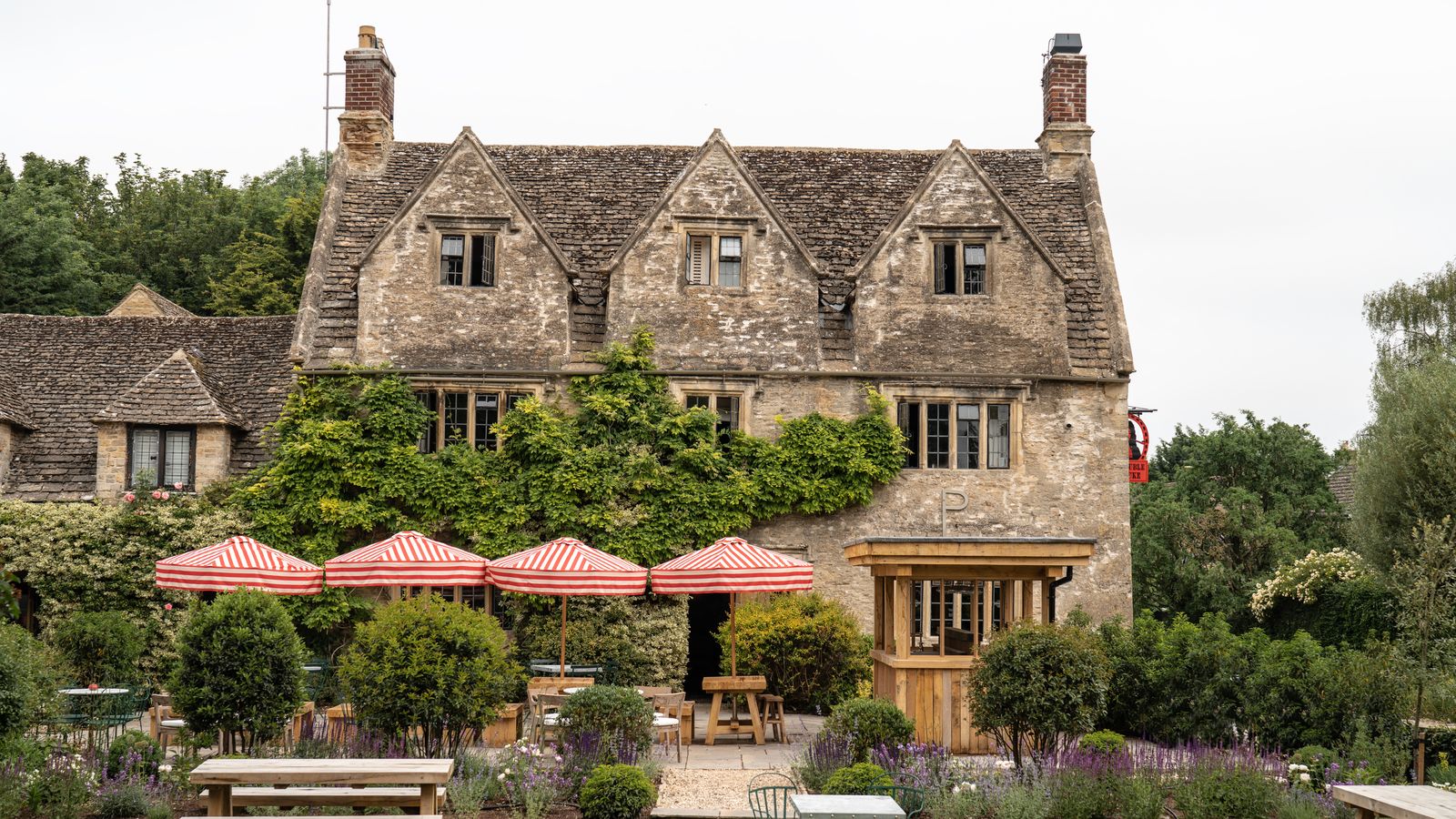 Image may contain: Furniture, Bench, Grass, Plant, Cottage, Housing, House, Building, Villa, and Roof