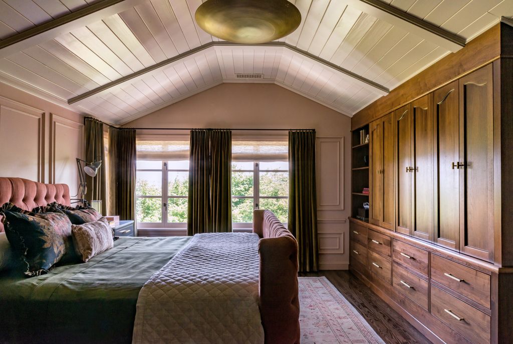 Image may contain Furniture Room Bedroom Indoors Interior Design Wood Housing Building Bed Hardwood and Flooring