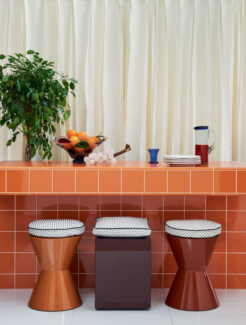 Curtain in ‘Brittany Glazed Linen  135 a metre from Paolo Moschino for Nicholas Haslam.  Porcelain ‘Ayce White Tiles...