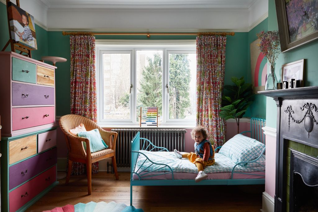 Image may contain Furniture Human Person Room Bedroom Indoors Bed Interior Design and Living Room